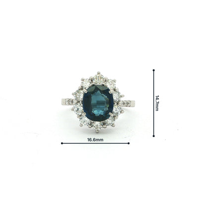 Vintage Deep Royal Blue Sapphire and Natural Diamond Halo Cluster Ring in Platinum