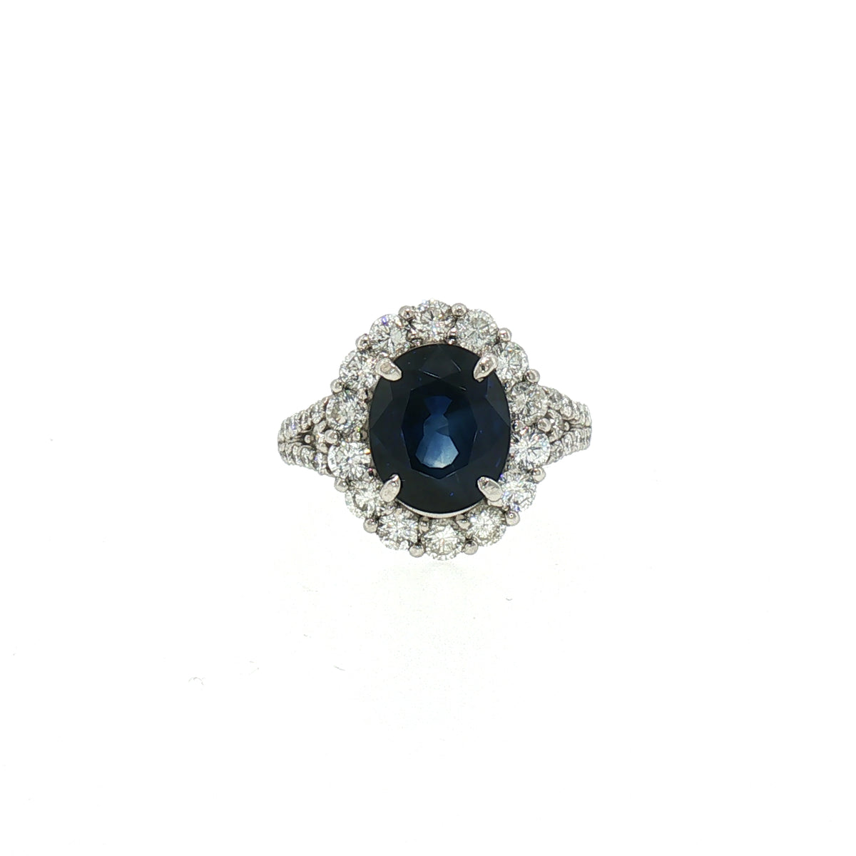 Vintage Oval Sapphire and Diamond Cluster Ring in Platinum