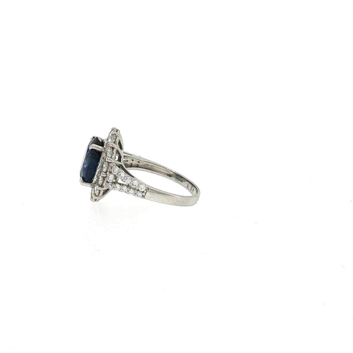 Vintage Oval Sapphire and Diamond Cluster Ring in Platinum