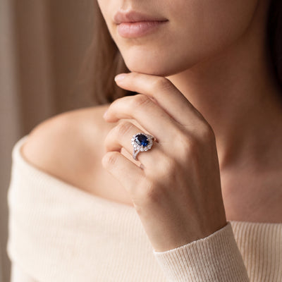 Vintage Oval Sapphire and Diamond Cluster Ring in Platinum