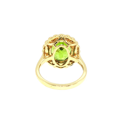 Vintage Natural Oval Peridot and Natural Diamond Halo Dress Ring in 18ct Yellow Gold