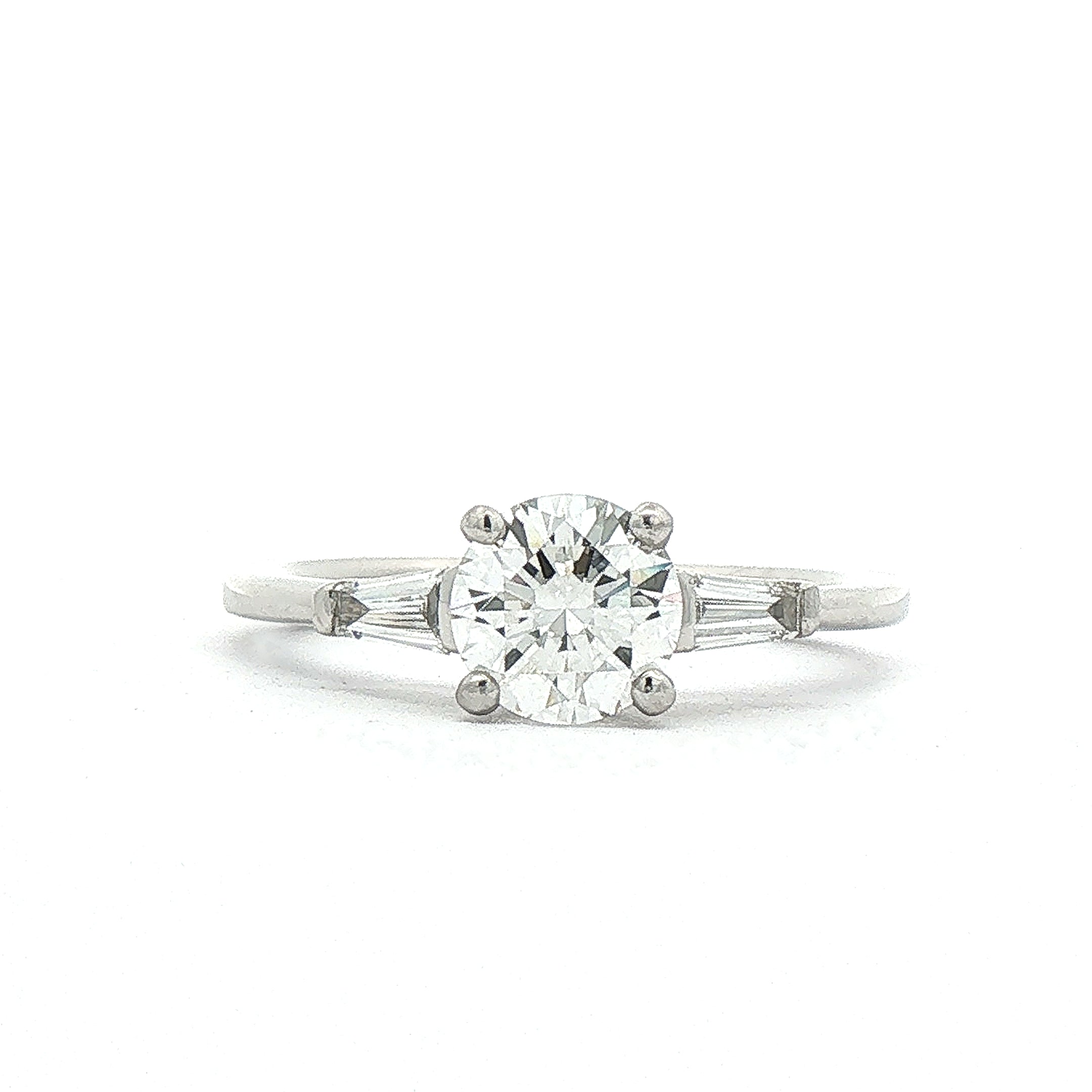 Platinum Natural Diamond Solitaire with Baguette Shoulders