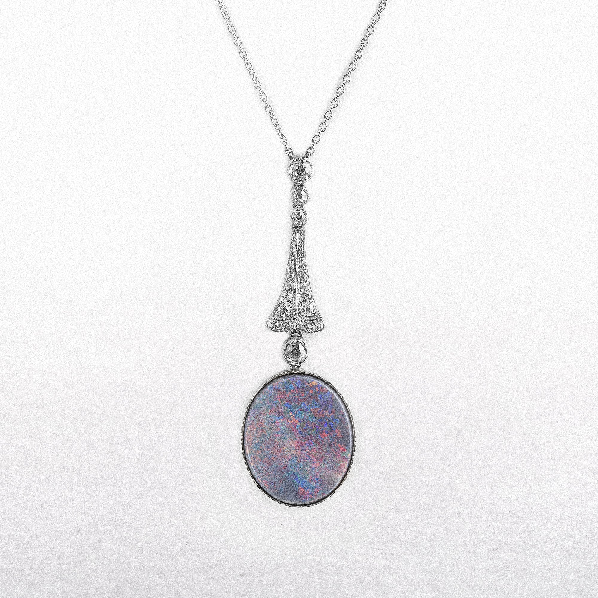 Black Oval Opal & Natural Diamond Drop Pendant in Platinum