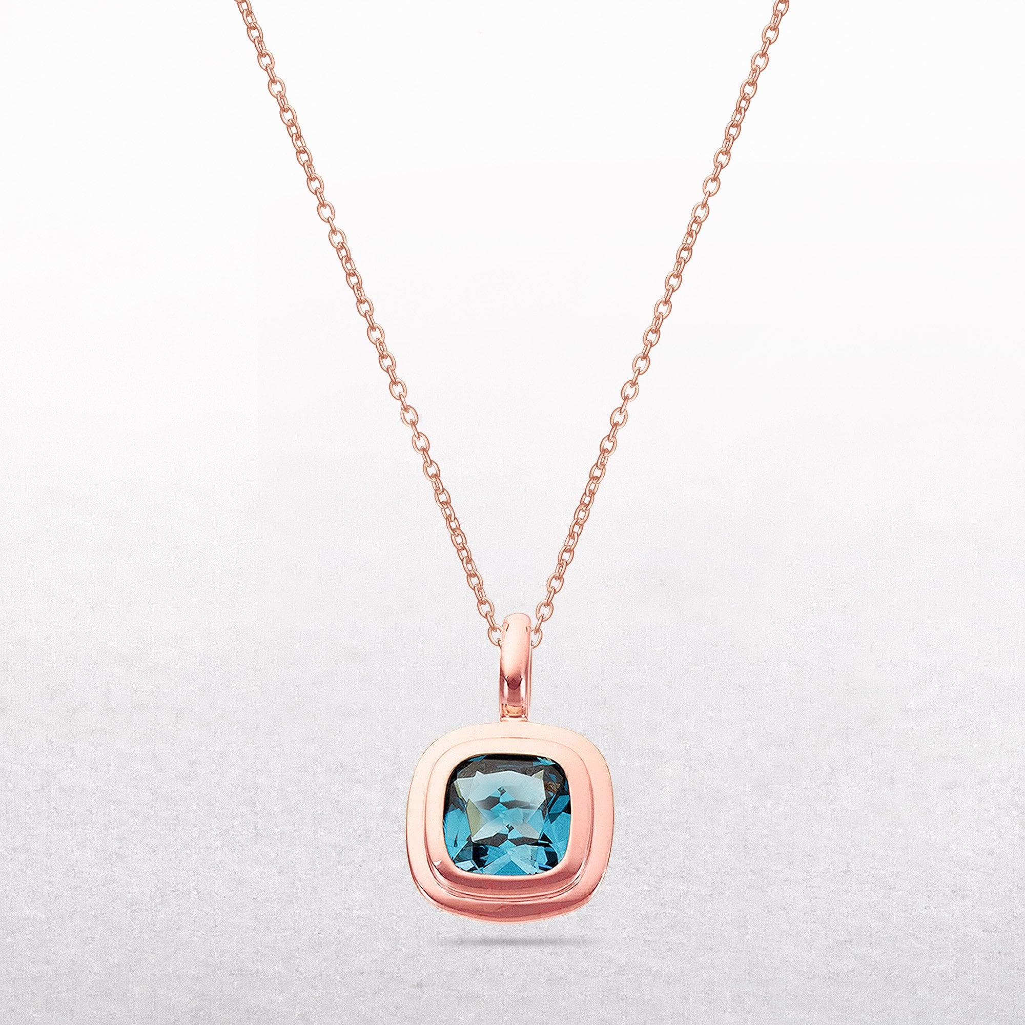Blue Topaz Rounded Square Pendant in 9ct Rose Gold