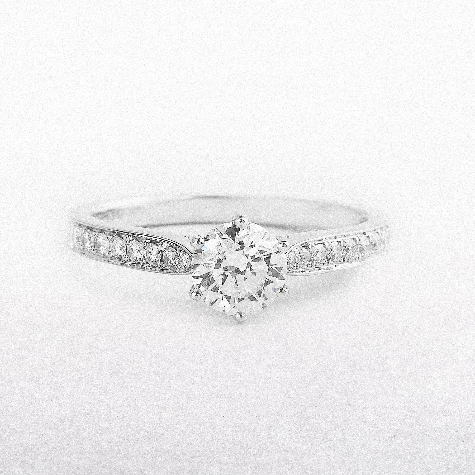 C0.70ct S0.18ct 6 Claw Solitaire Diamond Ring With Diamond Shoulders Set In 18ct White Gold