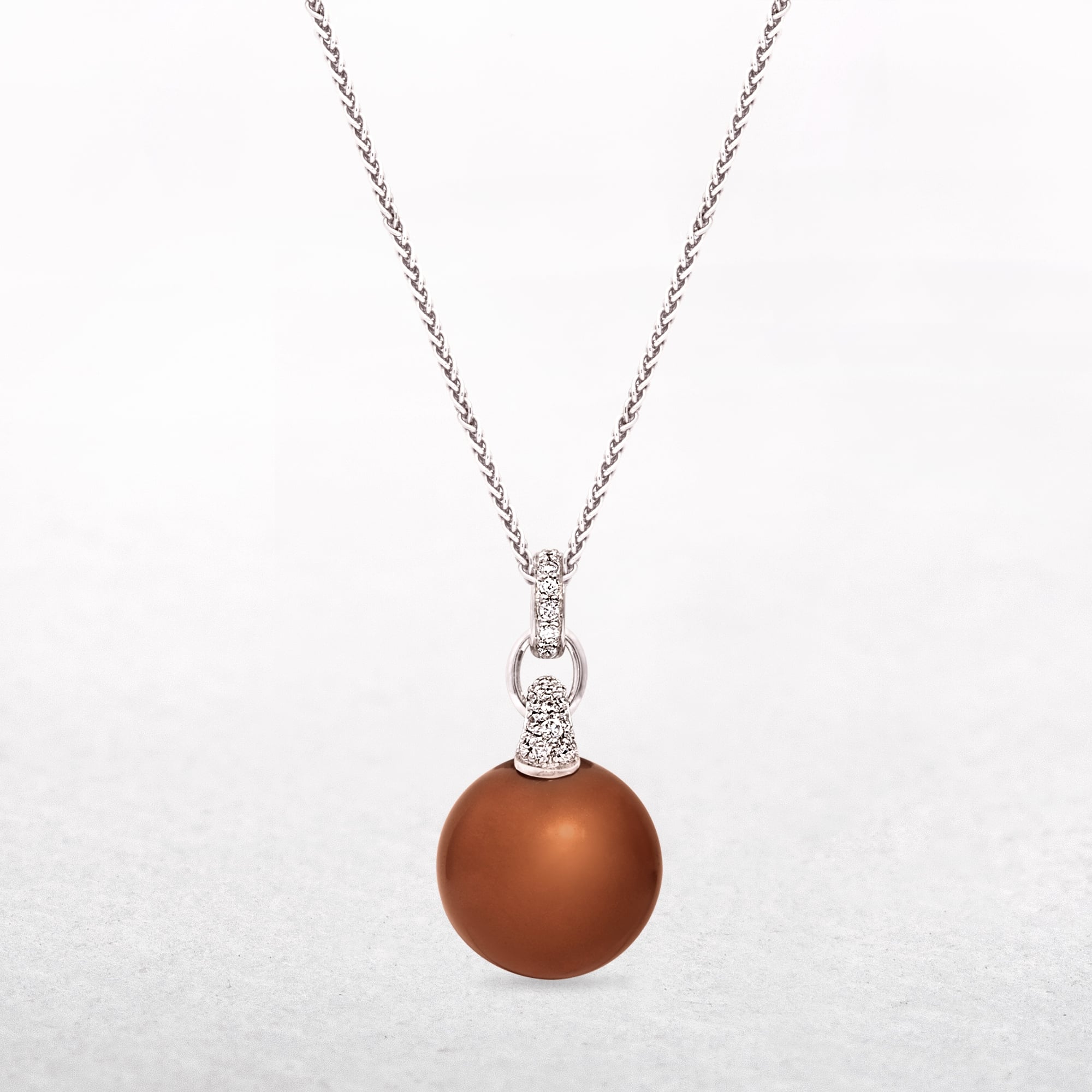 Copper Pearl Pendant with Silver & Cubic Zirconia Setting