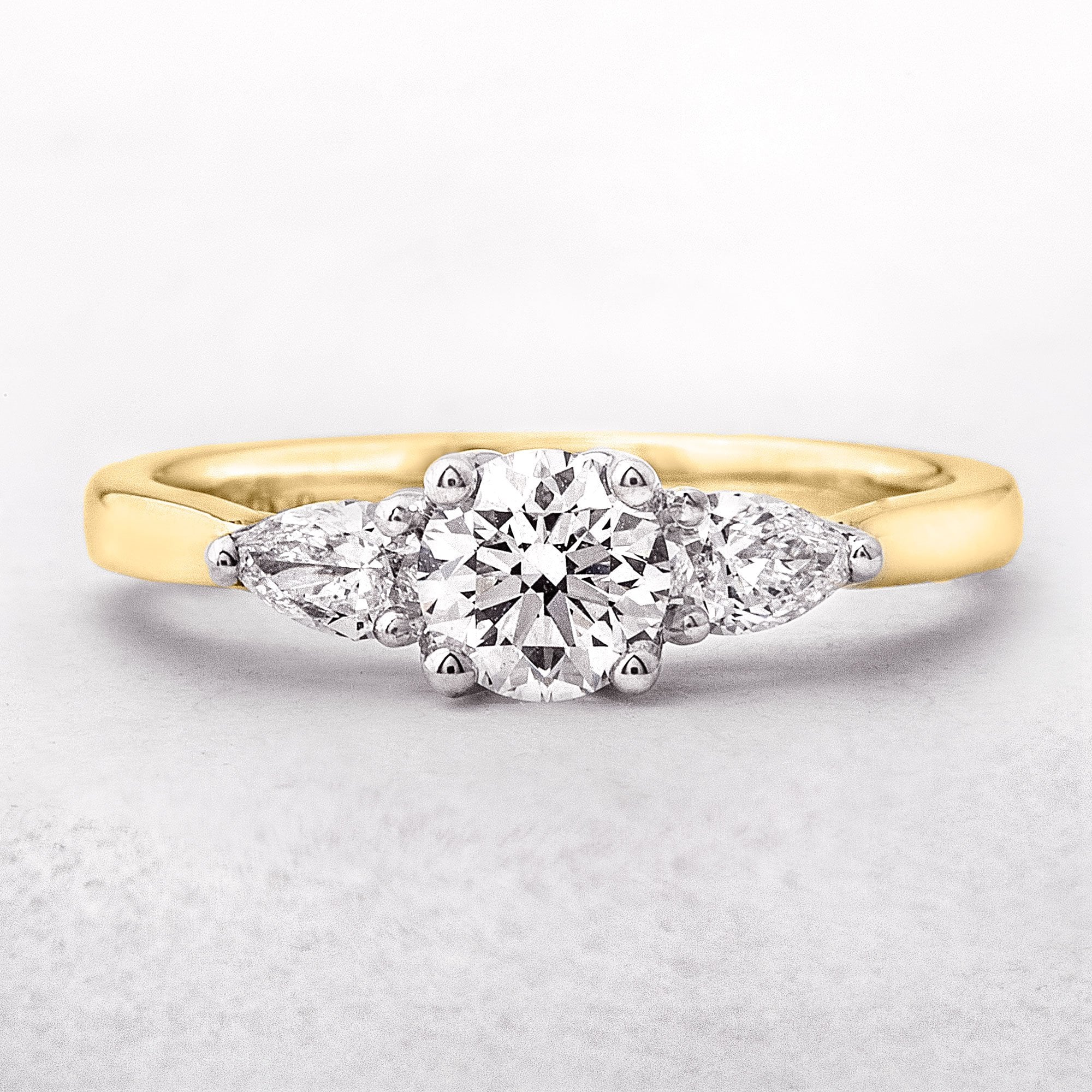 Diamonds 0.80ct E / SI1 GIA Certified Round with Pear Shoulders, 18ct Gold Ring