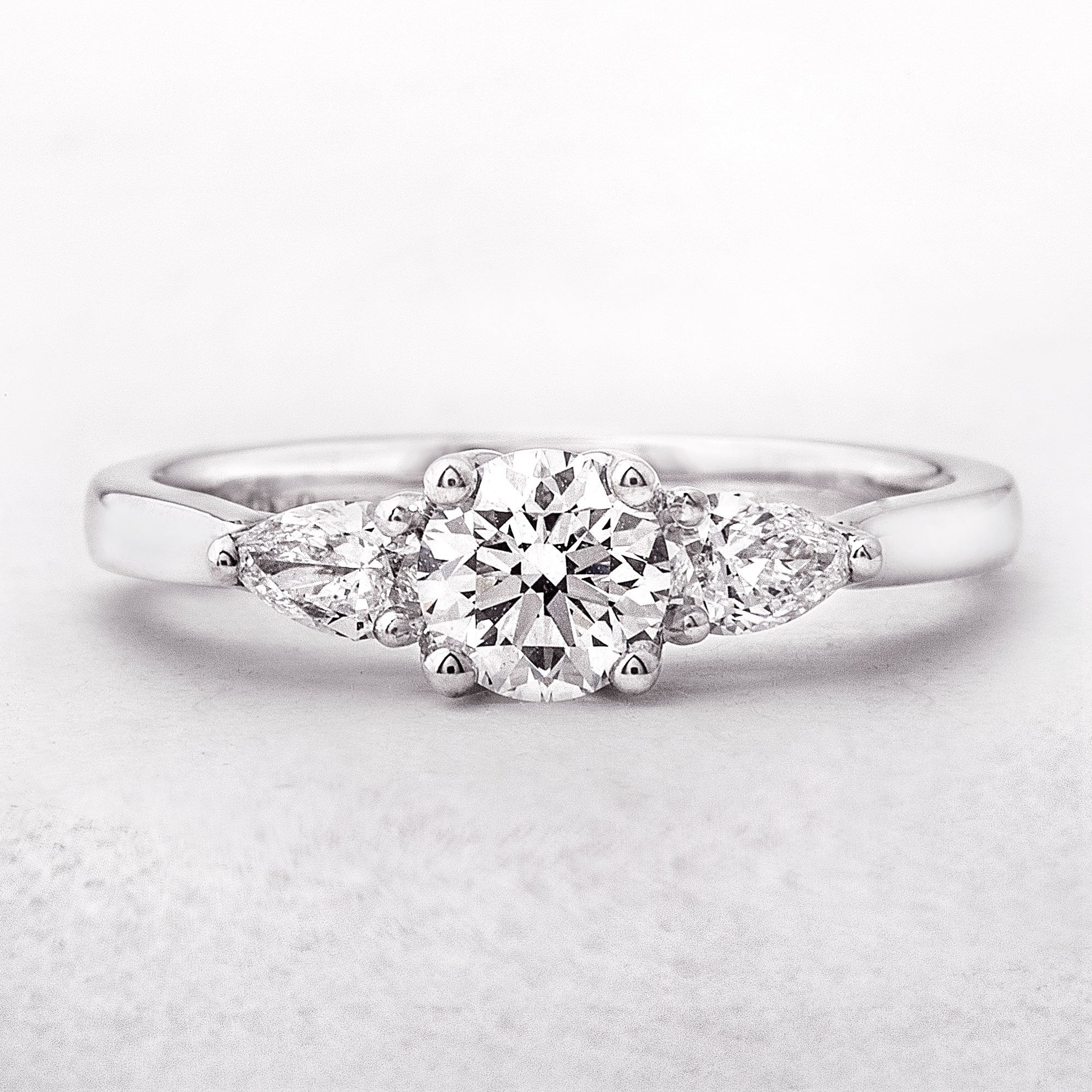 Diamonds 0.80ct E / VS2 GIA Certified Round with Pear Shoulders, Platinum Ring