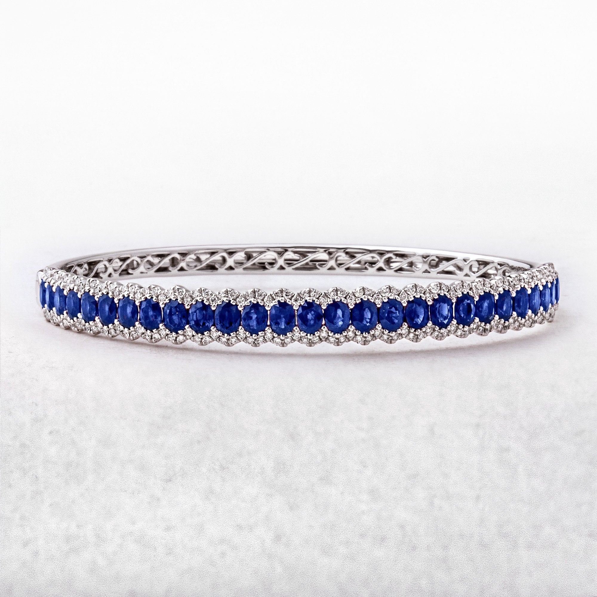Elegant 5.63ct Oval Sapphire and 0.86ct Diamond Bangle in 18ct White Gold