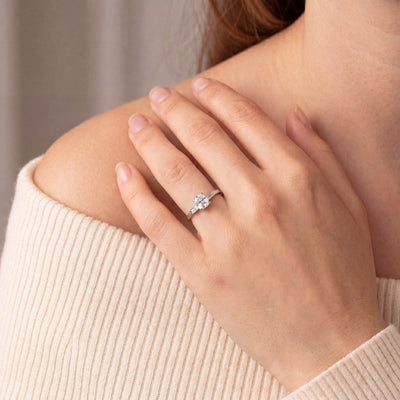 C0.73ct S0.11ct G si1 Cushion Cut Solitaire With Assher Side Diamonds Set In Platinum
