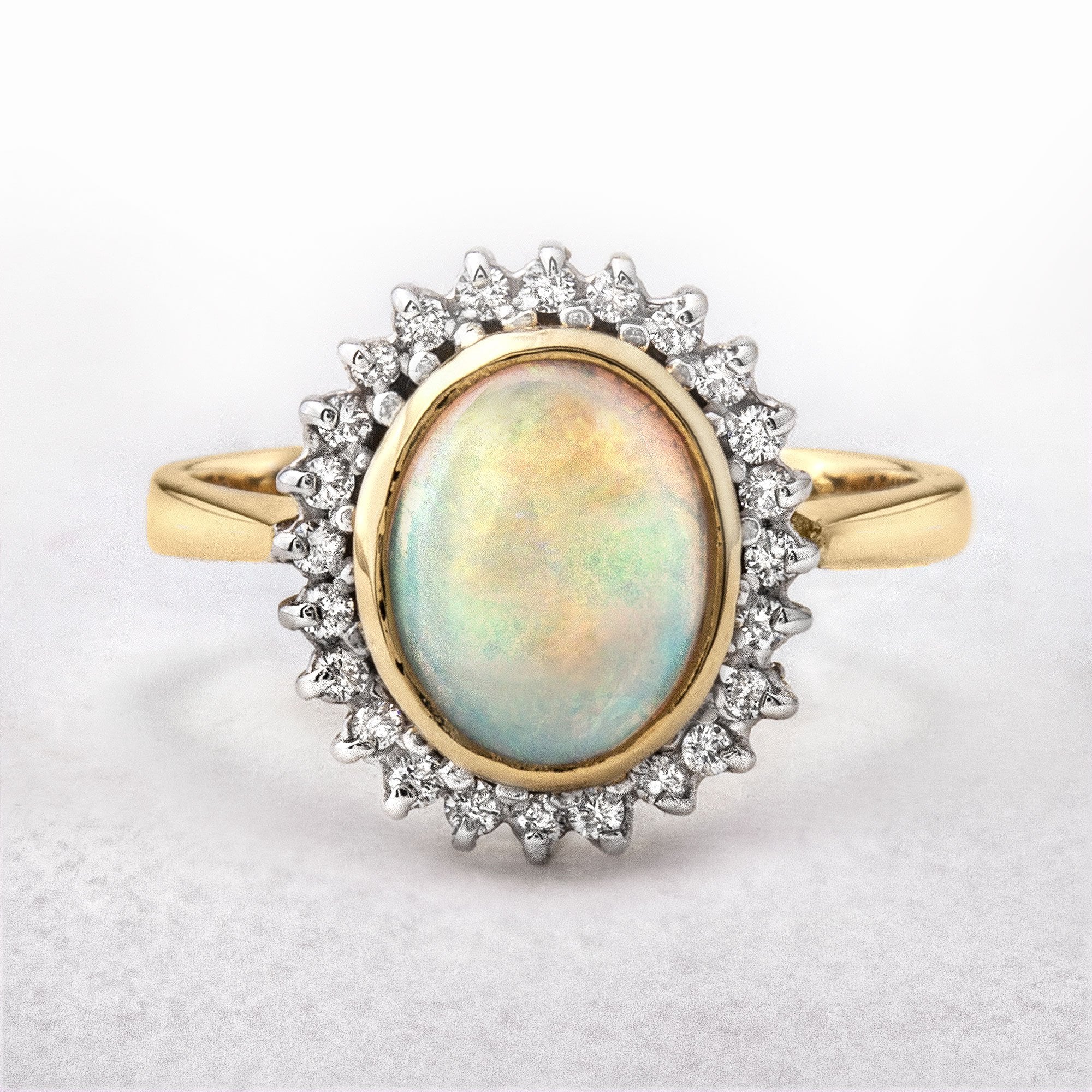 Opal and 0.24ct Diamond Ring in 18ct Yellow Gold