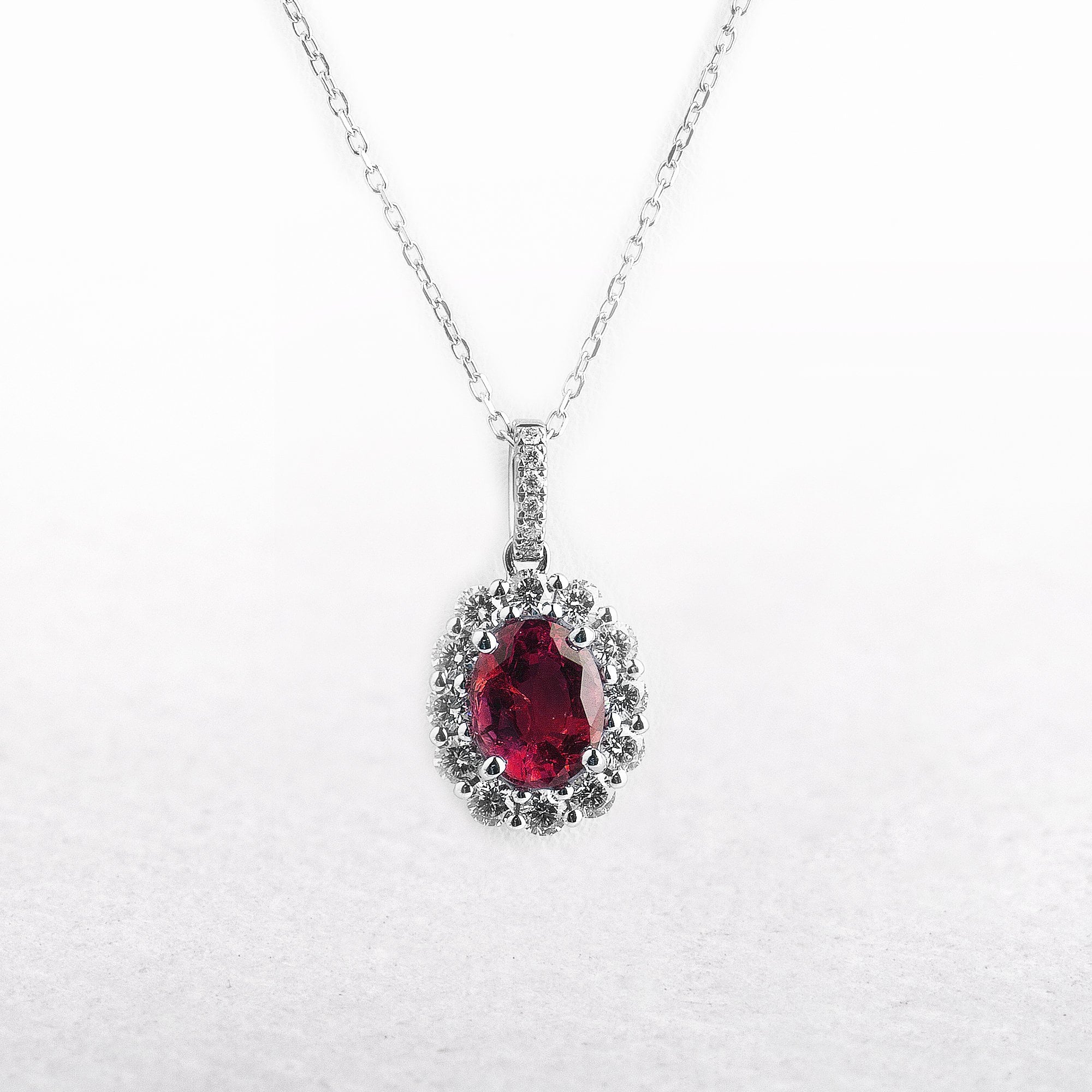 Oval Ruby & Natural Diamond Halo Pendant