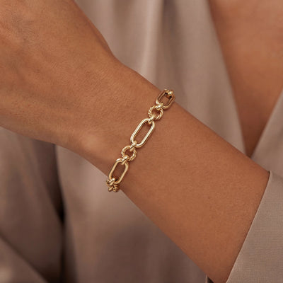 Oval with Twist Ring Link Bracelet in 9ct Yellow Gold