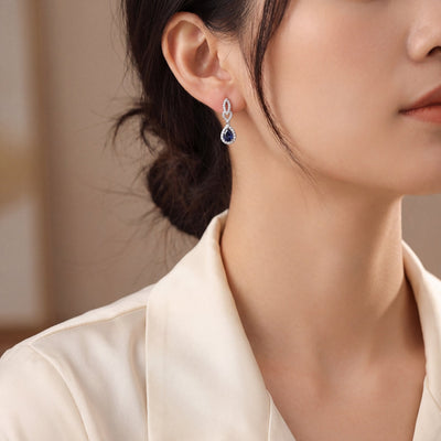 Pear Shaped Sapphire and Natural Diamond Drop Earrings in 18ct White Gold