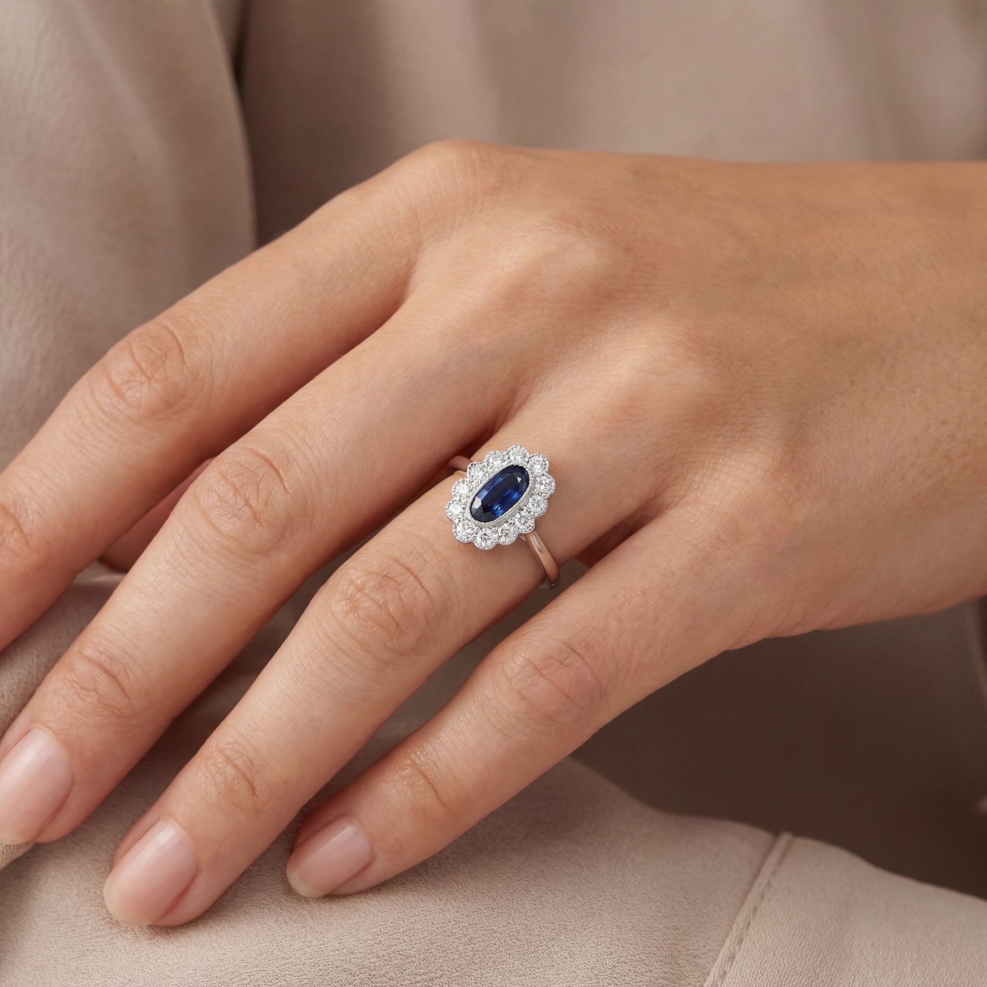 Platinum Art Deco Platinum narrow oval Sapphire and diam grain set ring