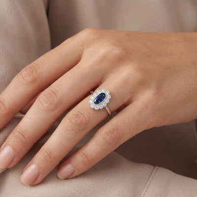 Platinum Vintage Art Deco Style Platinum narrow oval Sapphire and Natural Diamond grain set ring
