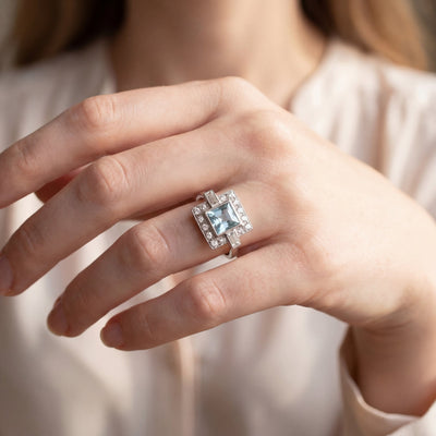 Princess Cut Aquamarine & Natural Diamond Cluster Halo with Baguettes Dress Ring in Platinum
