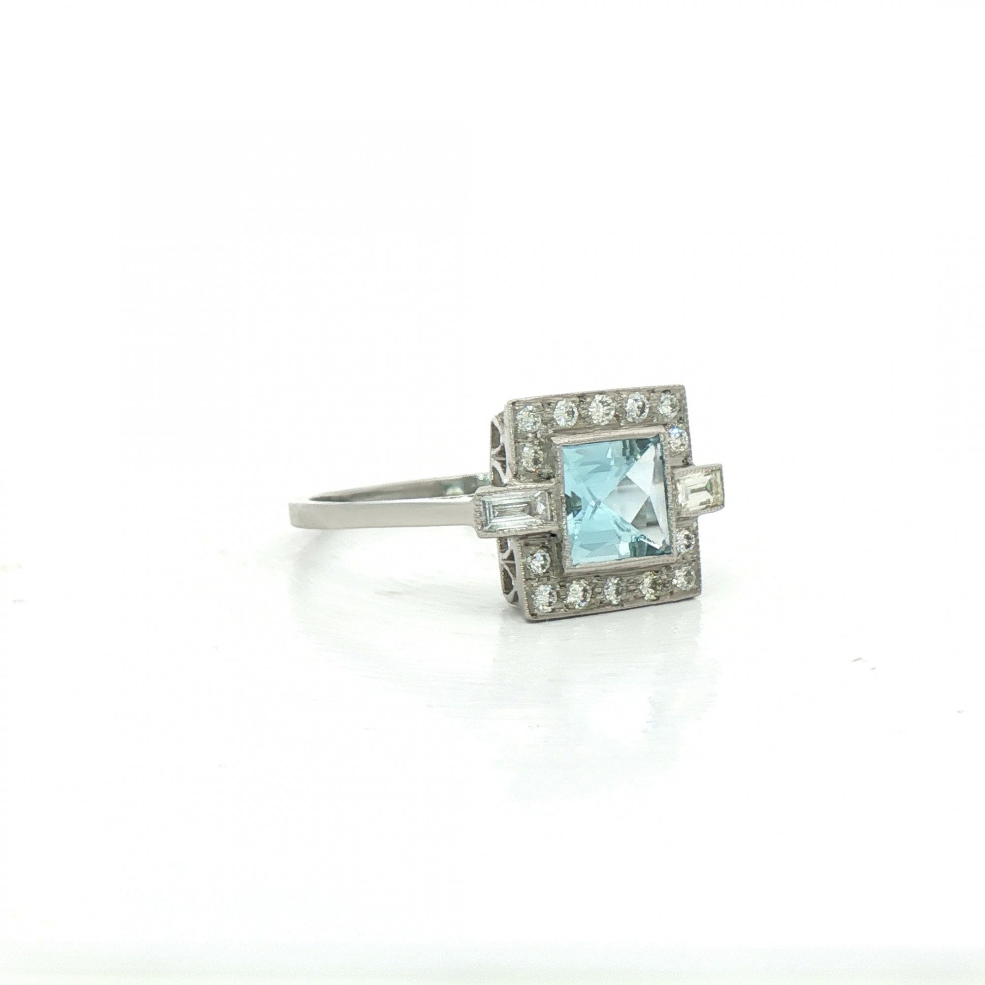 Princess Cut Aquamarine & Natural Diamond Cluster Halo with Baguettes Dress Ring in Platinum