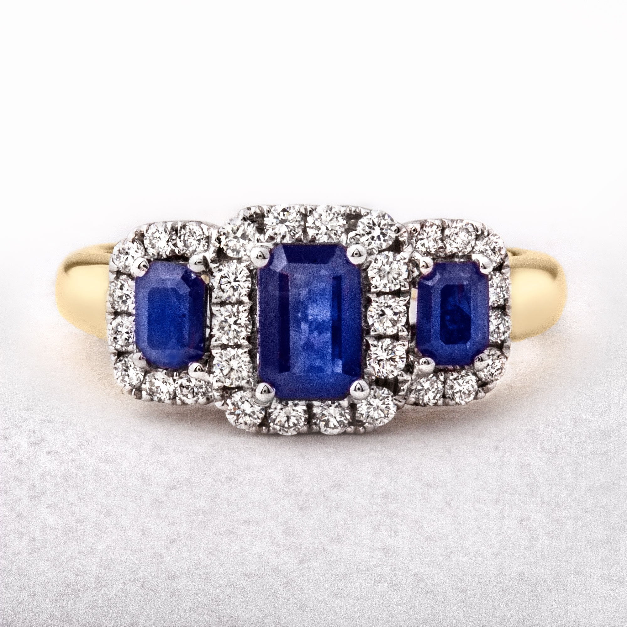 Sapphire Diamond Halo Three Stone Ring in 18ct Gold