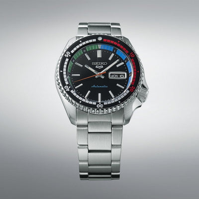 Seiko Gents 5 Sports Automatic Black Dial Accented With Green, Red, and Blue Details on Bracelet