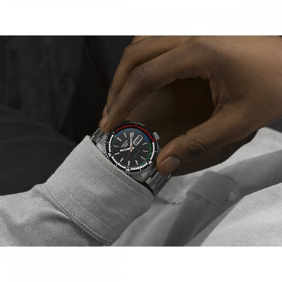 Seiko Gents 5 Sports Automatic Black Dial Accented With Green, Red, and Blue Details on Bracelet