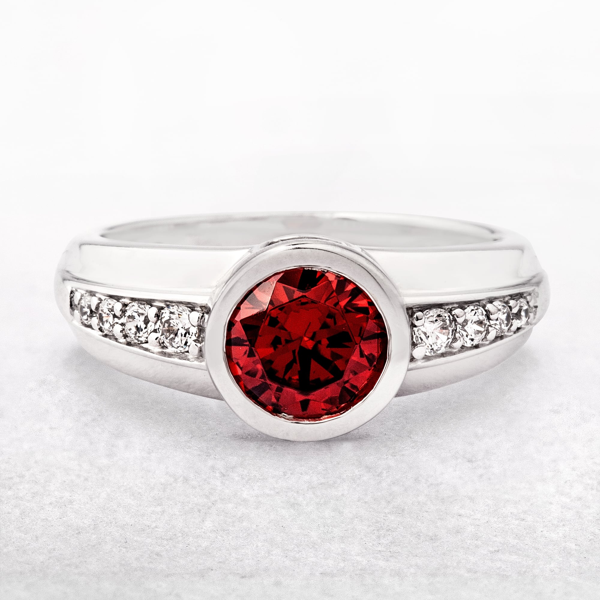 Sterling Silver Round Red Stone Ring with Cubic Zirconias