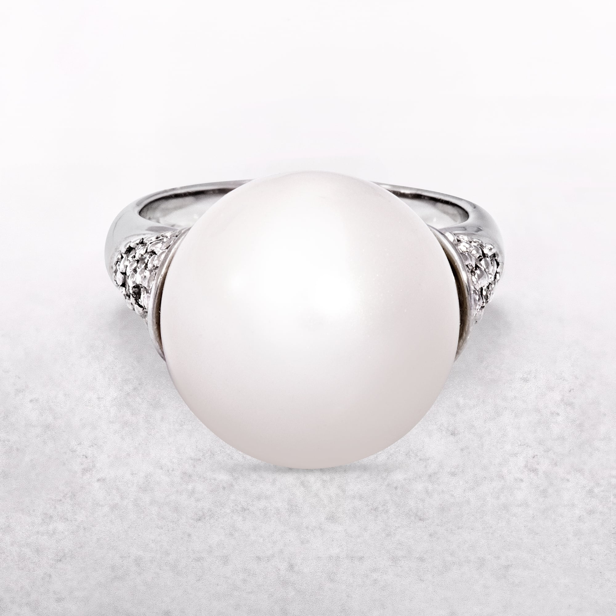 White Round Pearl Ring with Silver Band & Shoulder Detail
