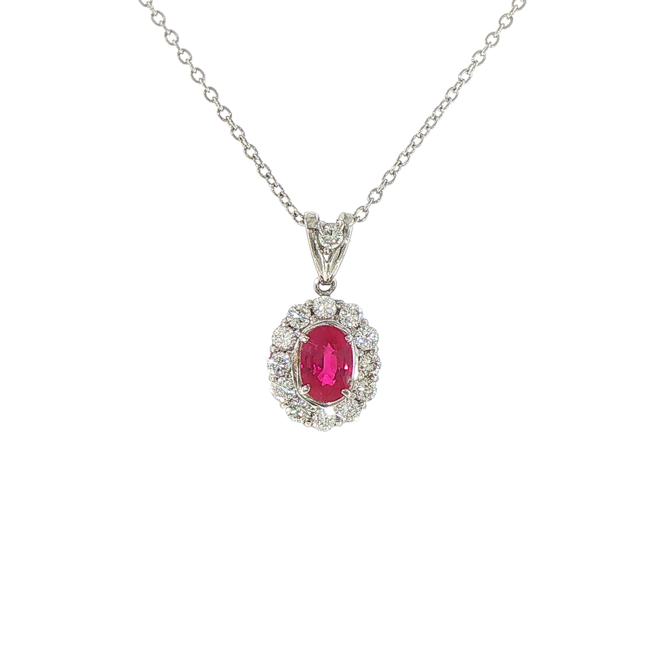 Certified 0.89 oval cut ruby surrounded by 0.48 cluster diamonds platinum pendant