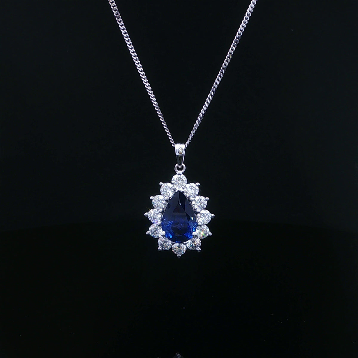 Pear-Cut Royal Blue Sapphire Halo Pendant in 18ct White Gold